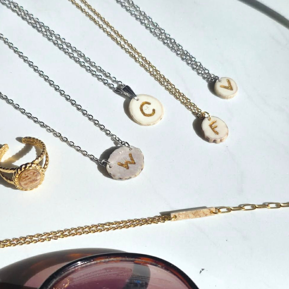 Tine Crest Necklace