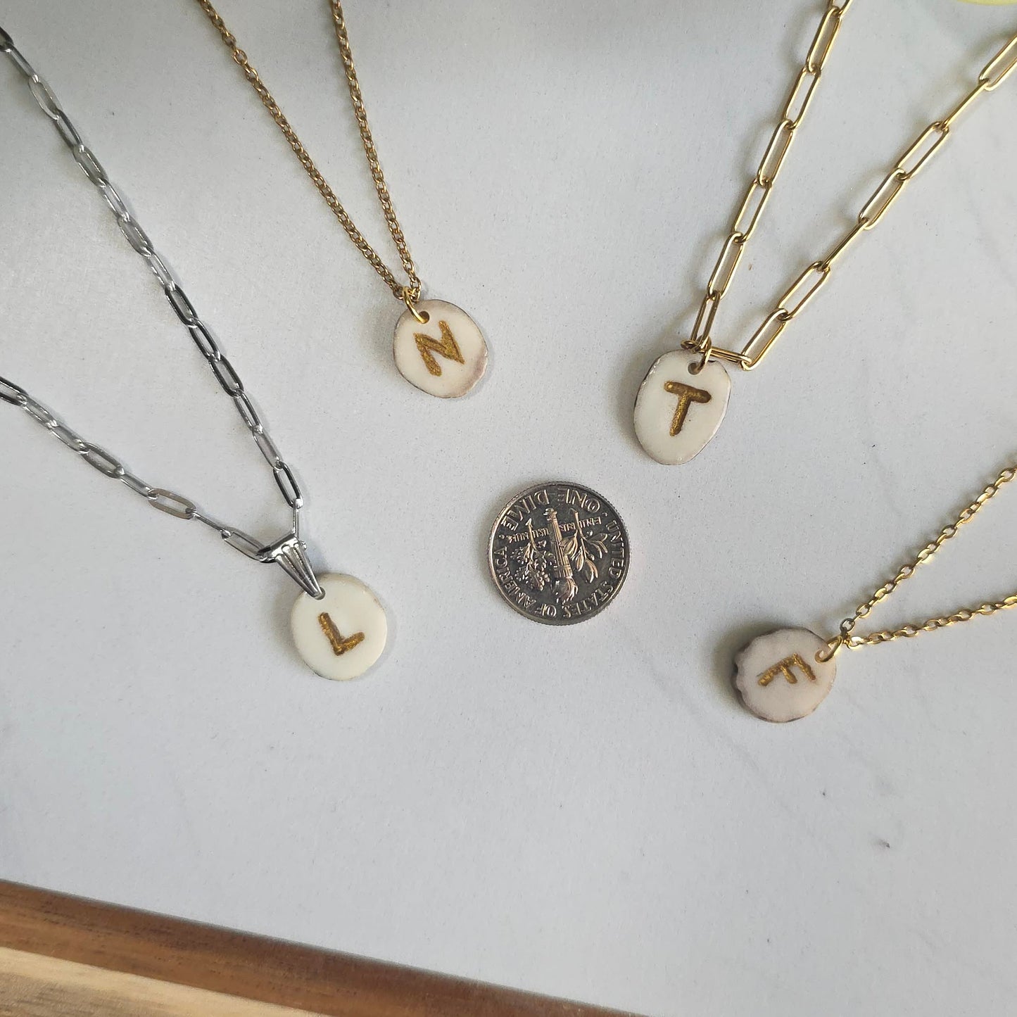 Tine Crest Necklace